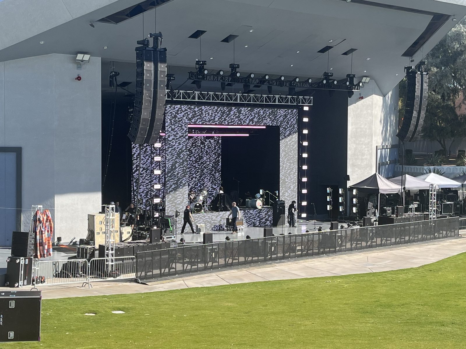 Outdoor Concert Stage — Widescreen LED wall, line array audio and lighting rig for an outdoor amphitheater show.