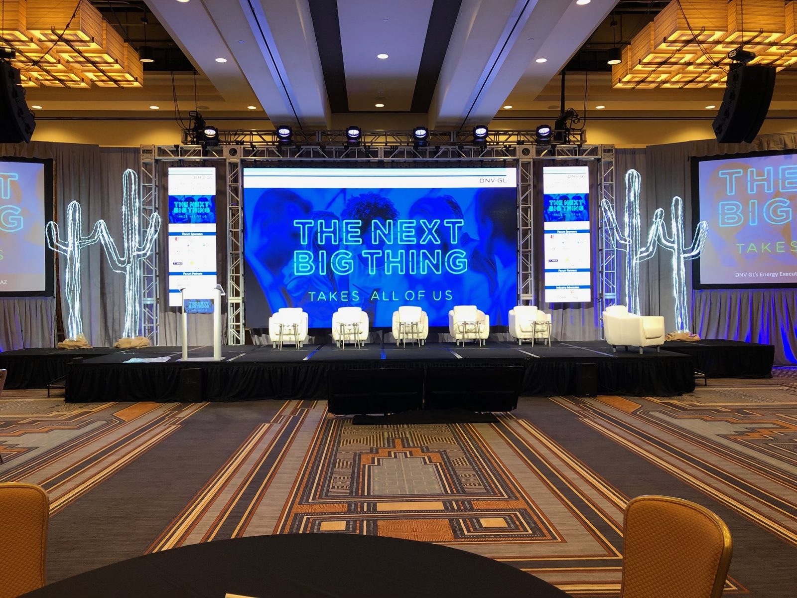Corporate General Session — Wide projection surface, presenter lighting and staging for a corporate conference.