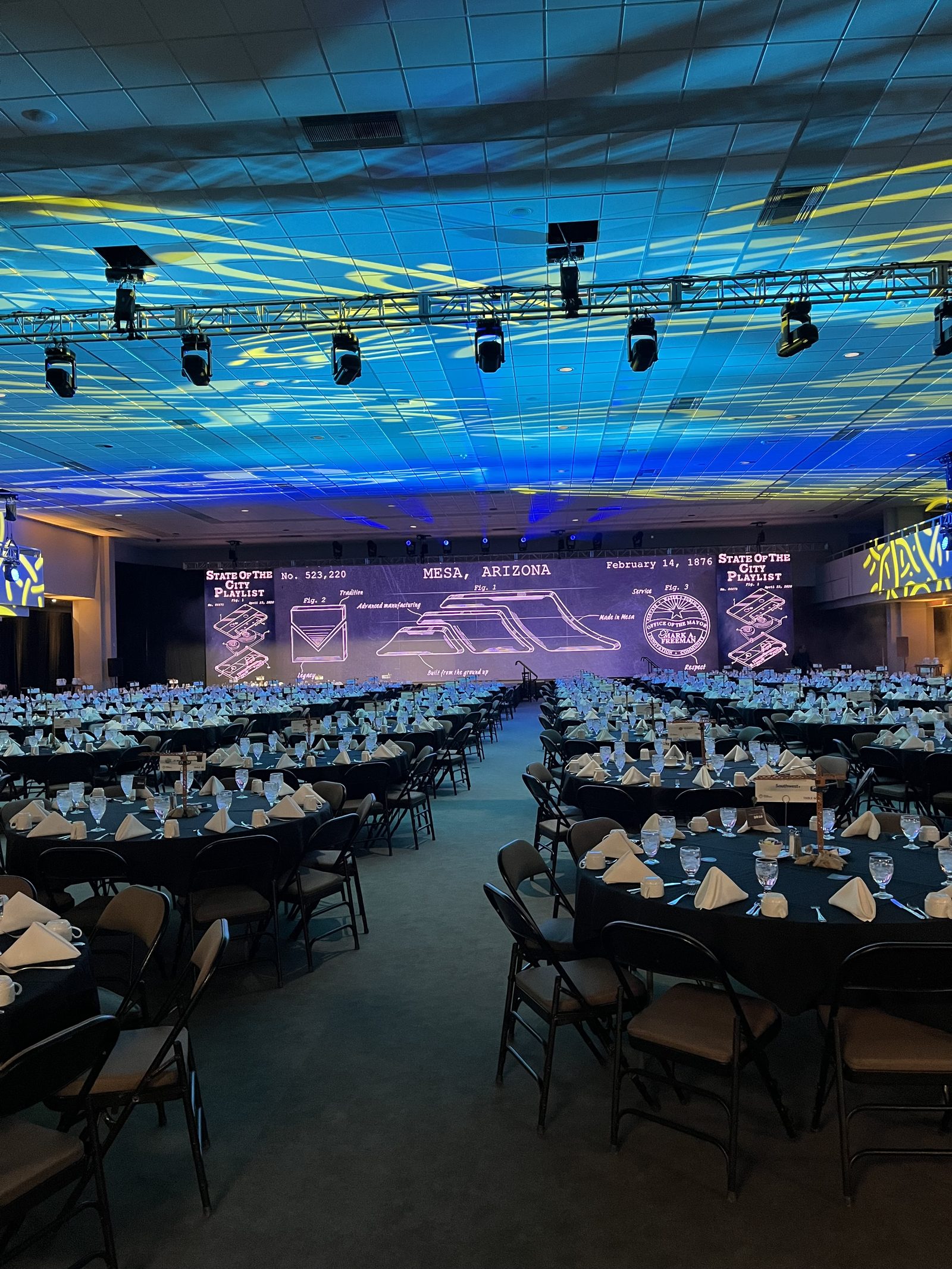 Mesa State of the City — Room-wide projection mapping and a panoramic LED stage backdrop over a 1,000+ seat banquet.